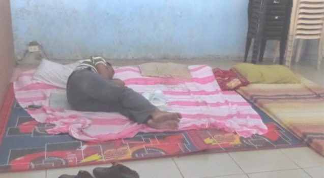 MAN SLEEPING